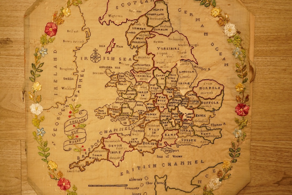 An 18th century embroidered map of England, unframed (distressed), 59cm high
